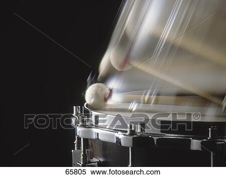 Stock Photography - Close-up of drumstick and snare drum . Fotosearch
