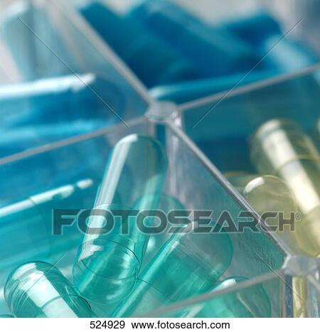 Close-up of empty capsules View Large Photo Image Stock Photo - Close-up of empty capsules . Fotosearch