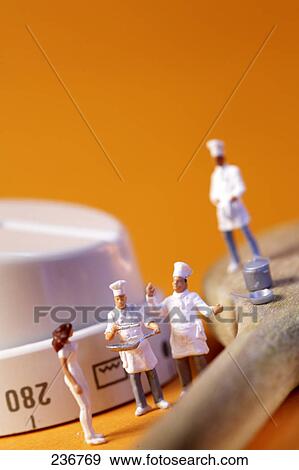 Stock Photo - Close-up of figurines of chefs . Fotosearch