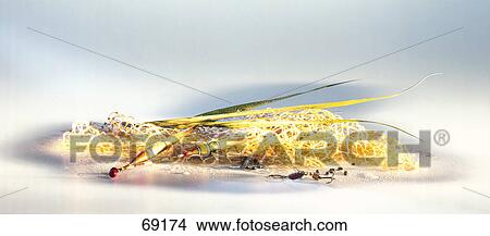 Picture - Close-up of fishing hooks and net Close-up of fishing hooks and net . Fotosearch
