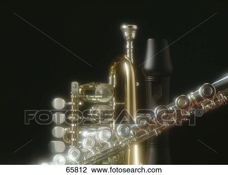 Close-up of flute and trumpet View Large Photo Image Stock Image - Close-up of flute and trumpet . Fotosearch