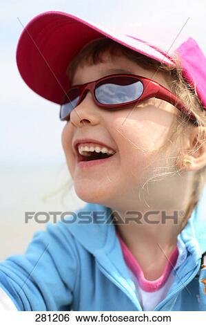 Close-up of girl smiling View Large Photo Image Stock Photograph - Close-up of girl smiling . Fotosearch