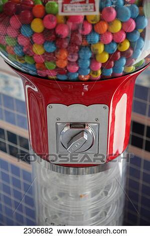 Stock Image - Close-up of gumball machine . Fotosearch