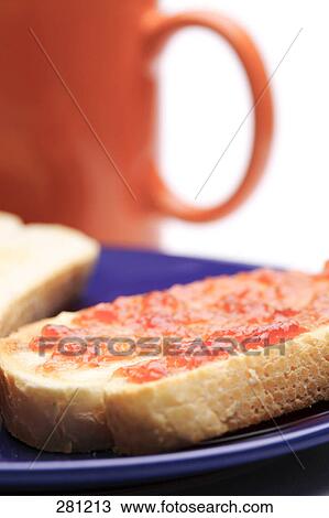 Close-up of jam on slice of bread View Large Photo Image Stock Image - Close-up of jam on slice of bread . Fotosearch