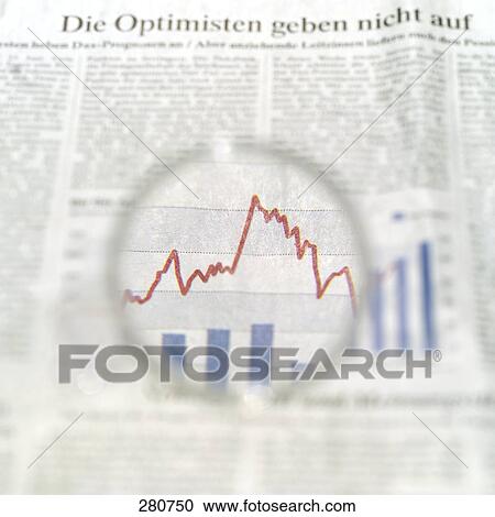 Stock Image - Close-up of magnifying glass on line graph . Fotosearch