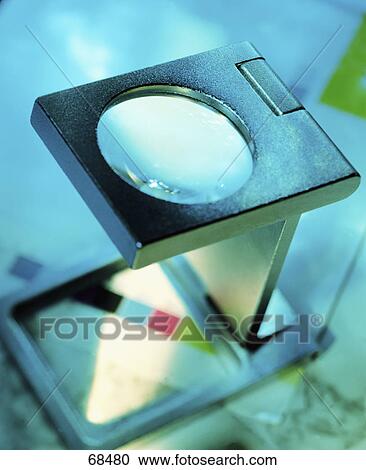 Close-up of magnifying glass View Large Photo Image Stock Image - Close-up of magnifying glass . Fotosearch