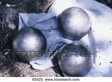 Close-up of metal balls on cloth View Large Photo Image Stock Photography - Close-up of metal balls on cloth . Fotosearch