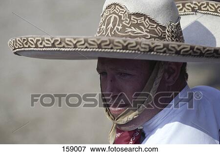 Close-up of middle aged man wearing traditional mexican hat, Mexico View Large Photo Image Stock Photo - Close-up of middle aged man wearing traditional mexican hat, Mexico . Fotosearch