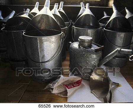 Stock Photograph - Close-up of oil cans . Fotosearch