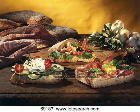 Stock Photo - Close-up of sandwiches on cutting board . Fotosearch