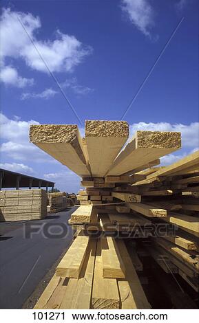 Close-up of stacked lumbers View Large Photo Image Stock Image - Close-up of stacked lumbers . Fotosearch