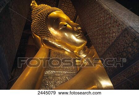 Close-up of statue of lying Buddha in temple, Wat Pho, Bangkok, Thailand View Large Photo Image Stock Photo - Close-up of statue of lying Buddha in temple, Wat Pho, Bangkok, Thailand . Fotosearch