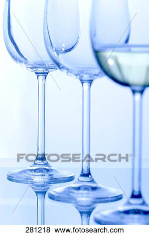 Stock Photo - Close-up of stem glasses in row . Fotosearch