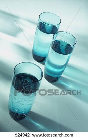 Close-up of three glasses full of water View Large Photo Image Stock Image - Close-up of three glasses full of water . Fotosearch