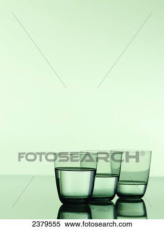 Close-up of three glasses of water View Large Photo Image Stock Photography - Close-up of three glasses of water . Fotosearch
