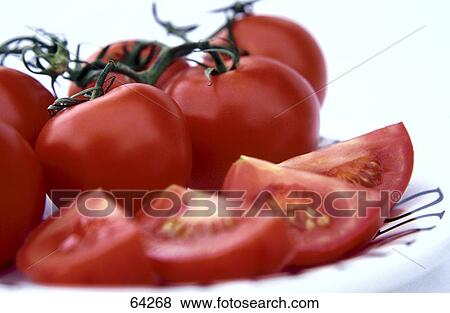 Close-up of tomatoes on plate View Large Photo Image Stock Photo - Close-up of tomatoes on plate . Fotosearch