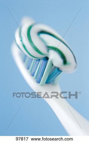 Close-up of toothpaste and toothbrush View Large Photo Image Stock Photo - Close-up of toothpaste and toothbrush . Fotosearch