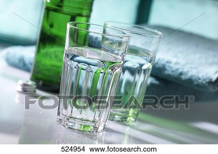 Picture - Close-up of two water glasses on table . Fotosearch
