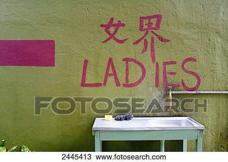 Close-up of wall with Ladies written on it View Large Photo Image Stock Image - Close-up of wall with Ladies written on it . Fotosearch