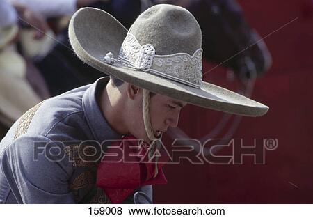 Close-up of young man wearing traditional mexican hat, Mexico View Large Photo Image Stock Photo - Close-up of young man wearing traditional mexican hat, Mexico . Fotosearch