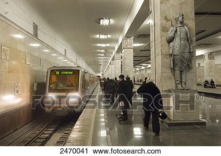 Commuter standing in metro station, Komsomolskaya, Moscow, Russia View Large Photo Image Stock Image - Commuter standing in metro station, Komsomolskaya, Moscow, Russia . Fotosearch