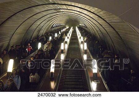 Commuters on escalator in subway station, Moscow, Russia View Large Photo Image Stock Image - Commuters on escalator in subway station, Moscow, Russia . Fotosearch