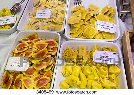 Dishes with pasta in a delicatessen, Treviso, Italy, elevated view View Large Photo Image Stock Photo - Dishes with pasta in a delicatessen, Treviso, Italy, elevated view . Fotosearch