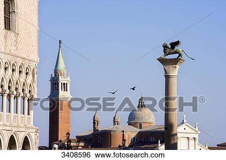 Doges Palace, St Mark's Campanile and San Marco Column, Venice, Italy, low angle view View Large Photo Image Stock Photograph - Doges Palace, St Mark's Campanile and San Marco Column, Venice, Italy, low angle view . Fotosearch
