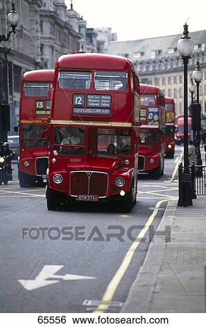 Double-decker buses on road View Large Photo Image Stock Photograph - Double-decker buses on road . Fotosearch