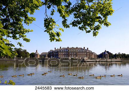 Ducks in pond with moated castle in background, Coesfeld, Munster, North Rhine-Westphalia, Germany View Large Photo Image Stock Image - Ducks in pond with moated castle in background, Coesfeld, Munster, North Rhine-Westphalia, Germany . Fotosearch