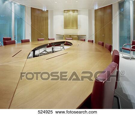 Stock Photography - Empty chairs and table in conference room . Fotosearch
