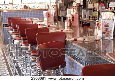 Empty stools at marble bar counter View Large Photo Image Stock Image - Empty stools at marble bar counter . Fotosearch