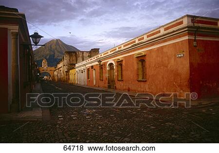 Stock Photo - Empty street leading to archway in town, Guatemala . Fotosearch