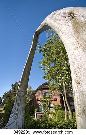 Stock Photography - Entrance of a museum (Friesenmuseum) in Wyk, Foehr, Schleswig-Holstein, Germany, low angle view . Fotosearch