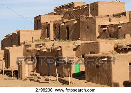 Facade of adobe buildings, Taos Pueblo, Taos, New Mexico, USA View Large Photo Image Stock Photo - Facade of adobe buildings, Taos Pueblo, Taos, New Mexico, USA . Fotosearch
