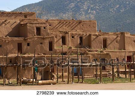 Facade of adobe buildings, Taos Pueblo, Taos, New Mexico, USA View Large Photo Image Stock Photo - Facade of adobe buildings, Taos Pueblo, Taos, New Mexico, USA . Fotosearch