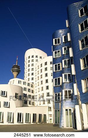 Stock Image - Facade of office buildings, Neuer Zollhof, Media Harbor, Dusseldorf, North Rhine-Westphalia, Germany . Fotosearch