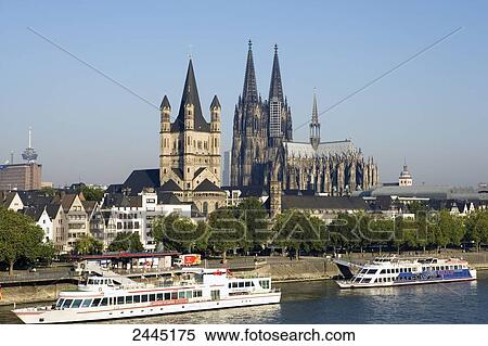 Stock Photography - Ferry in river, Rhine River, Cologne Cathedral, Cologne, North Rhine-Westphalia, Germany . Fotosearch