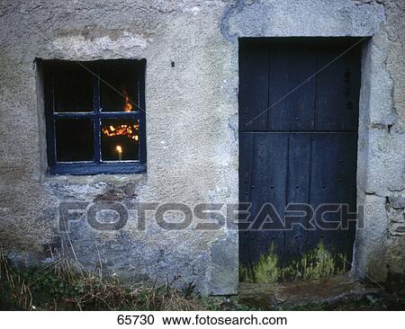 Fireplace in house viewed through window View Large Photo Image Stock Image - Fireplace in house viewed through window . Fotosearch