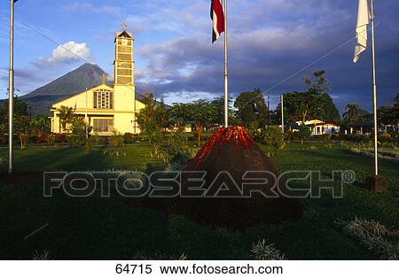 Flags in front of church at dusk, La Fortuna, Costa Rica View Large Photo Image Stock Photography - Flags in front of church at dusk, La Fortuna, Costa Rica . Fotosearch