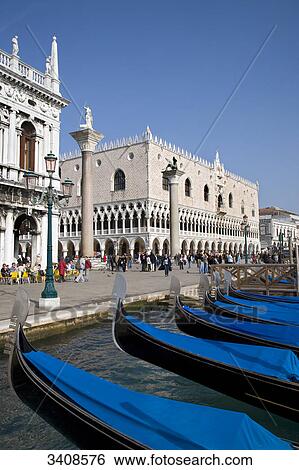 Gondolas in front of a seaside promenade, Venice, Italy View Large Photo Image Stock Photograph - Gondolas in front of a seaside promenade, Venice, Italy . Fotosearch