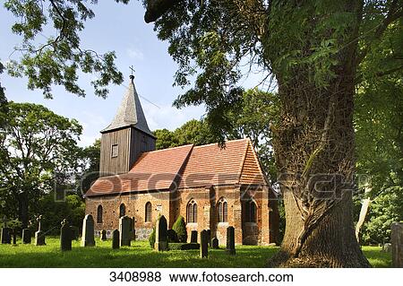 Stock Photo - Gravestones on cemetery near church, Gross Zicker, Moenchgut, Ruegen, Germany . Fotosearch