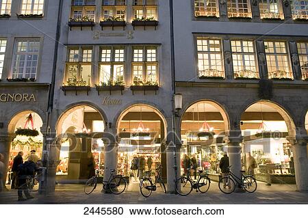 Stock Image - Group of people at market . Fotosearch
