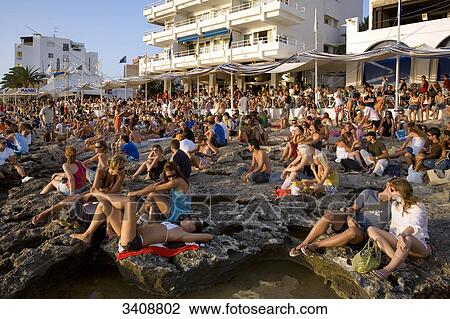 Group of people in front of Cafe del Mar, Sant Antoni de Portmany, Ibiza, Spain View Large Photo Image Stock Image - Group of people in front of Cafe del Mar, Sant Antoni de Portmany, Ibiza, Spain . Fotosearch