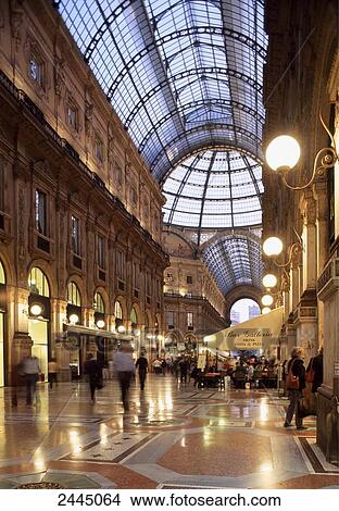 Group of people in shopping mall, Lombardy, Milan, Italy View Large Photo Image Picture - Group of people in shopping mall, Lombardy, Milan, Italy . Fotosearch