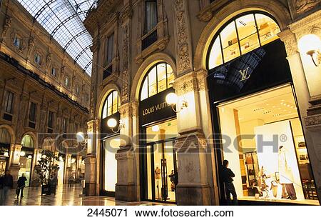 Group of people in shopping mall, Lombardy, Milan, Italy View Large Photo Image Stock Image - Group of people in shopping mall, Lombardy, Milan, Italy . Fotosearch