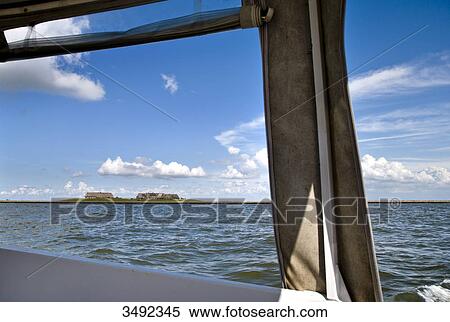 Stock Photography - Hallig Groede seen from a ship, Nordfriesland, Schleswig-Holstein, Germany . Fotosearch