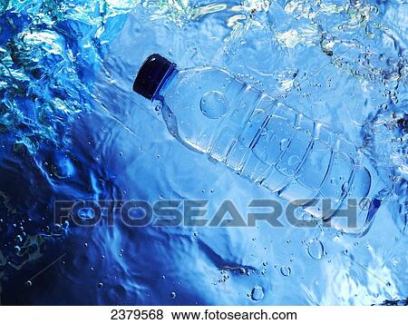 High angle view of bottle in water View Large Photo Image Stock Photo - High angle view of bottle in water . Fotosearch