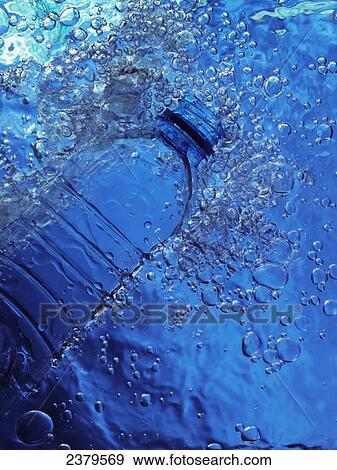High angle view of bottle in water View Large Photo Image Stock Photo - High angle view of bottle in water . Fotosearch