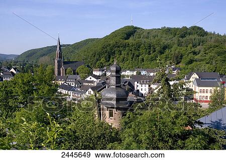 Stock Photo - High angle view of buildings and church in town, Schleiden-Gemund, Eifel, North Rhine-Westphalia, Germany . Fotosearch